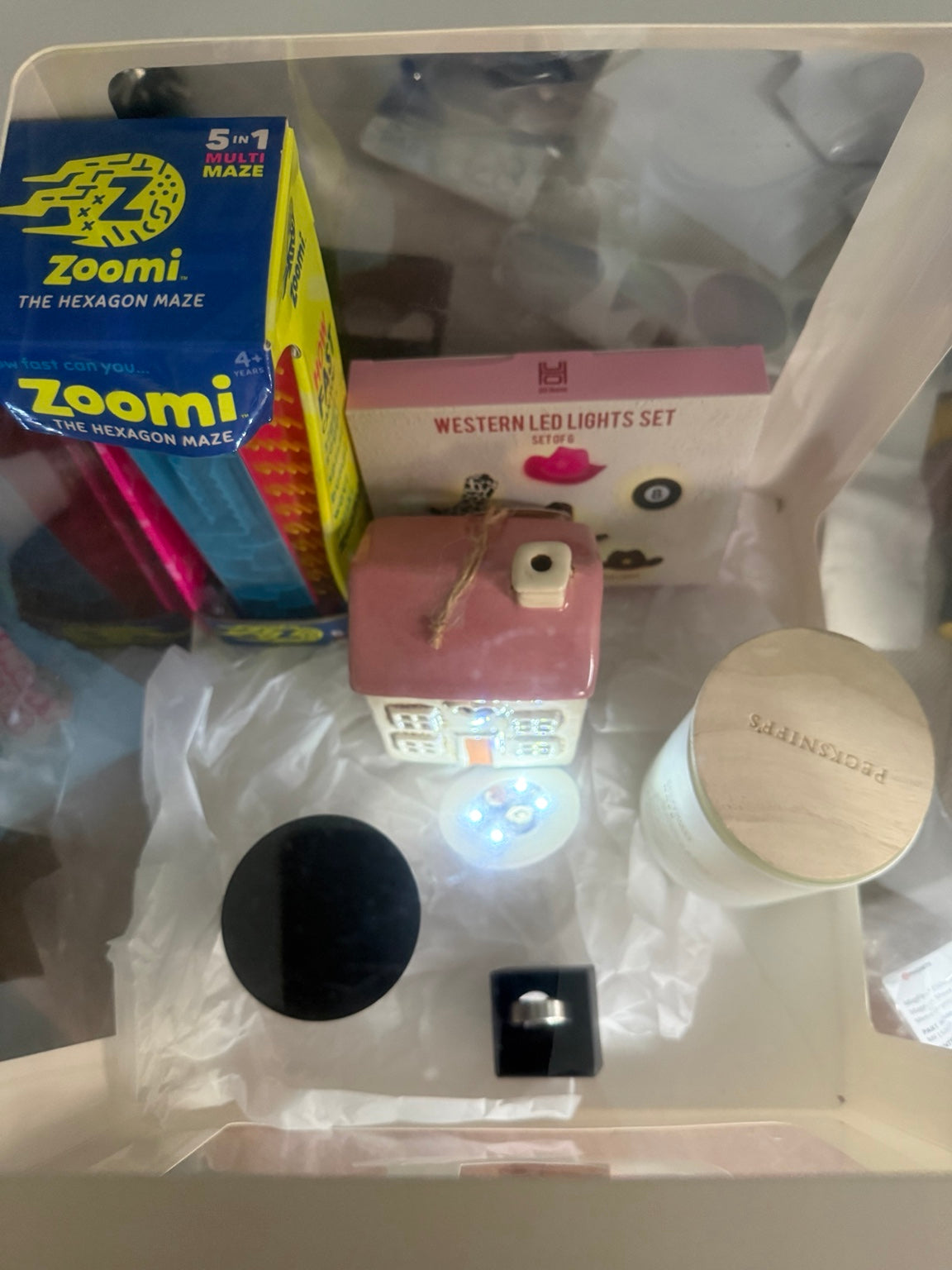 Example custom gift box with home gifts and a maze puzzle; contents sold separately