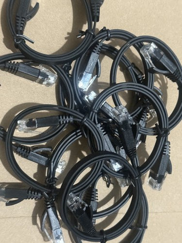 Black flat Ethernet cables — pictured lot
