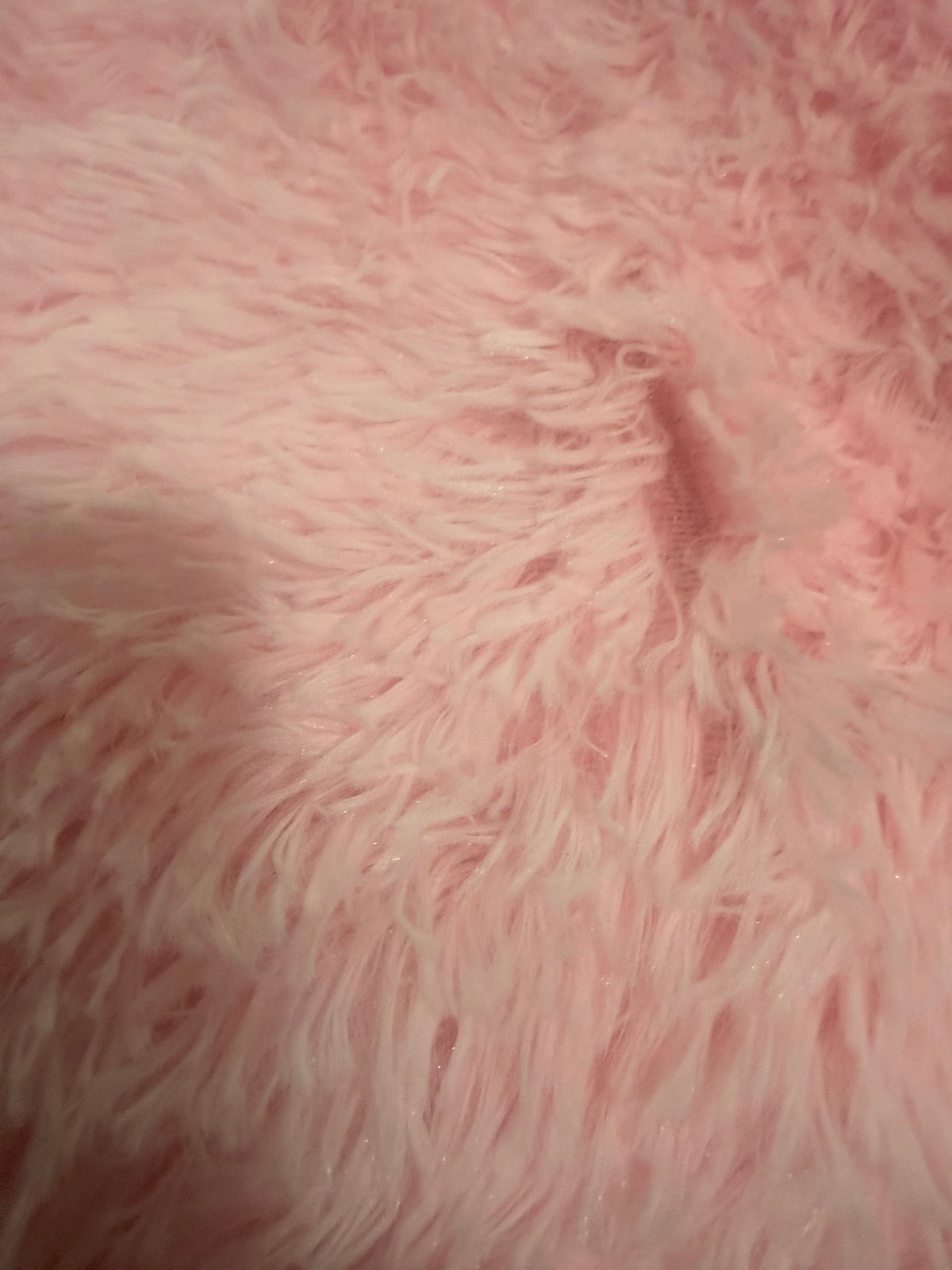 Close-up of the pink shaggy rug pile