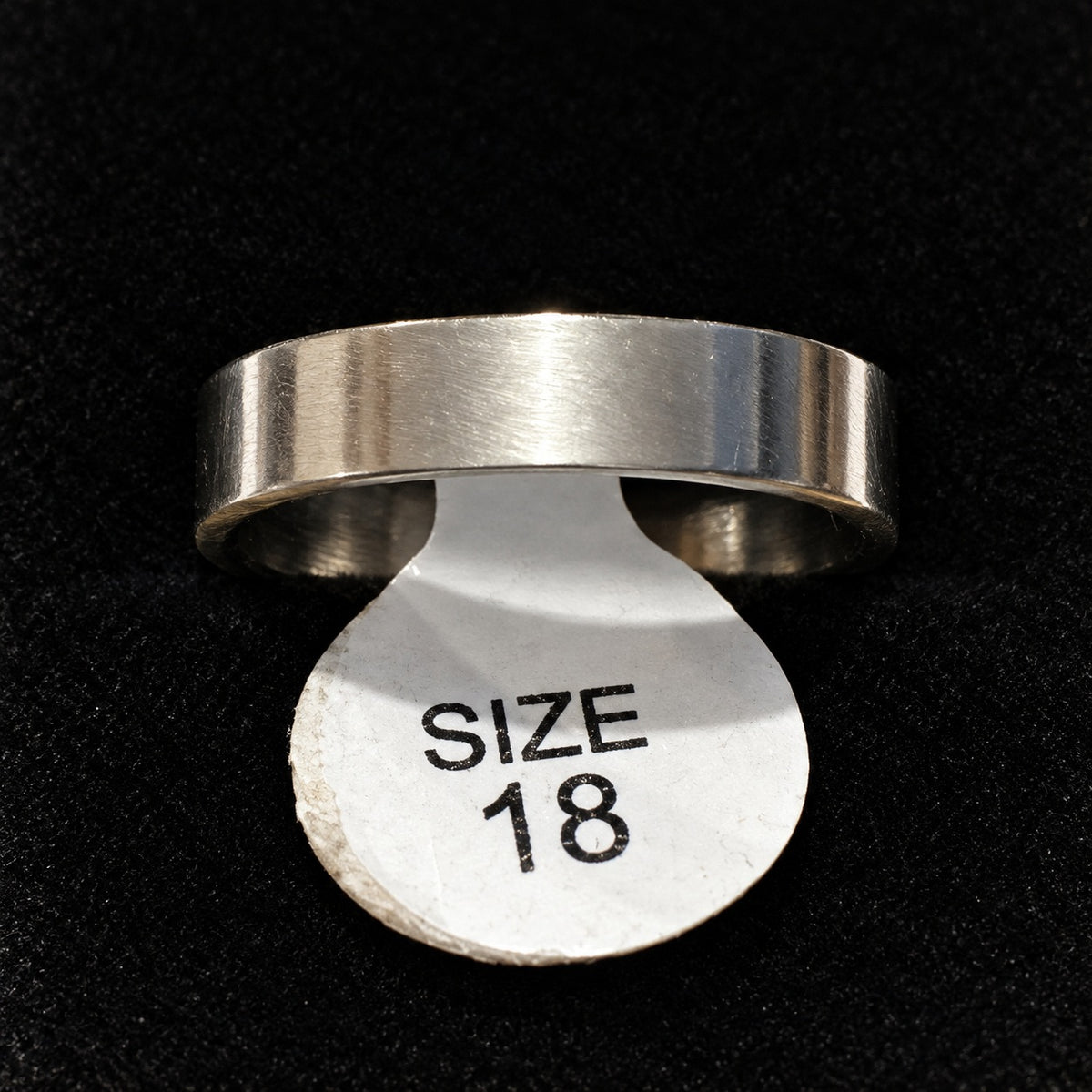 Silver-tone plain stainless steel ring, label size 18