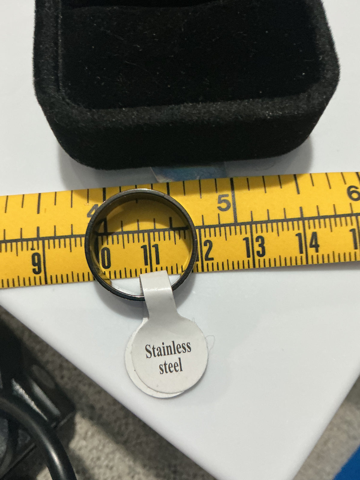 Original detail photograph of silver-tone textured double groove band