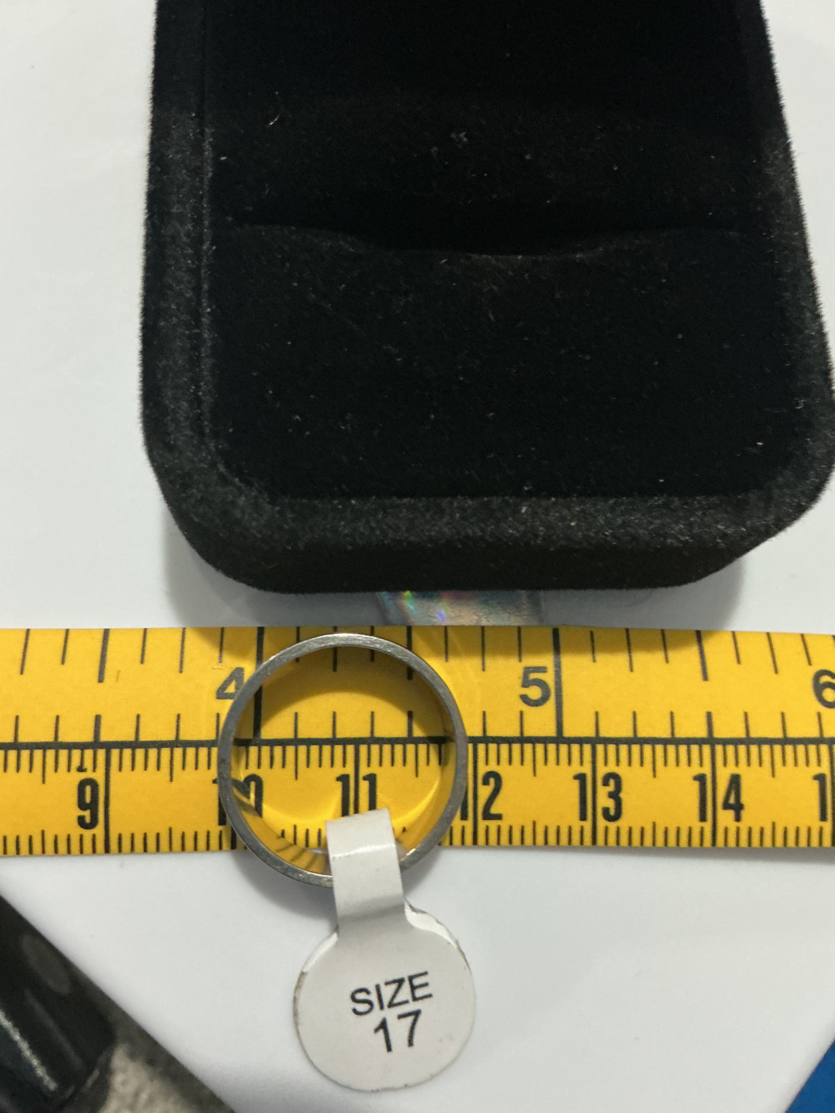 Original detail photograph of silver-tone ridged band