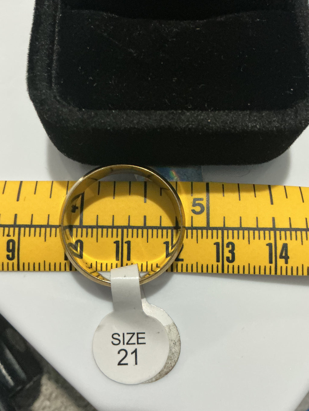 Original detail photograph of gold-tone heart script band