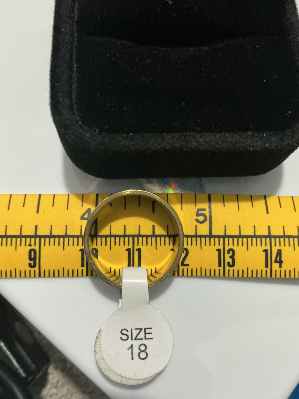 Original detail photograph of gold-tone polished double groove band
