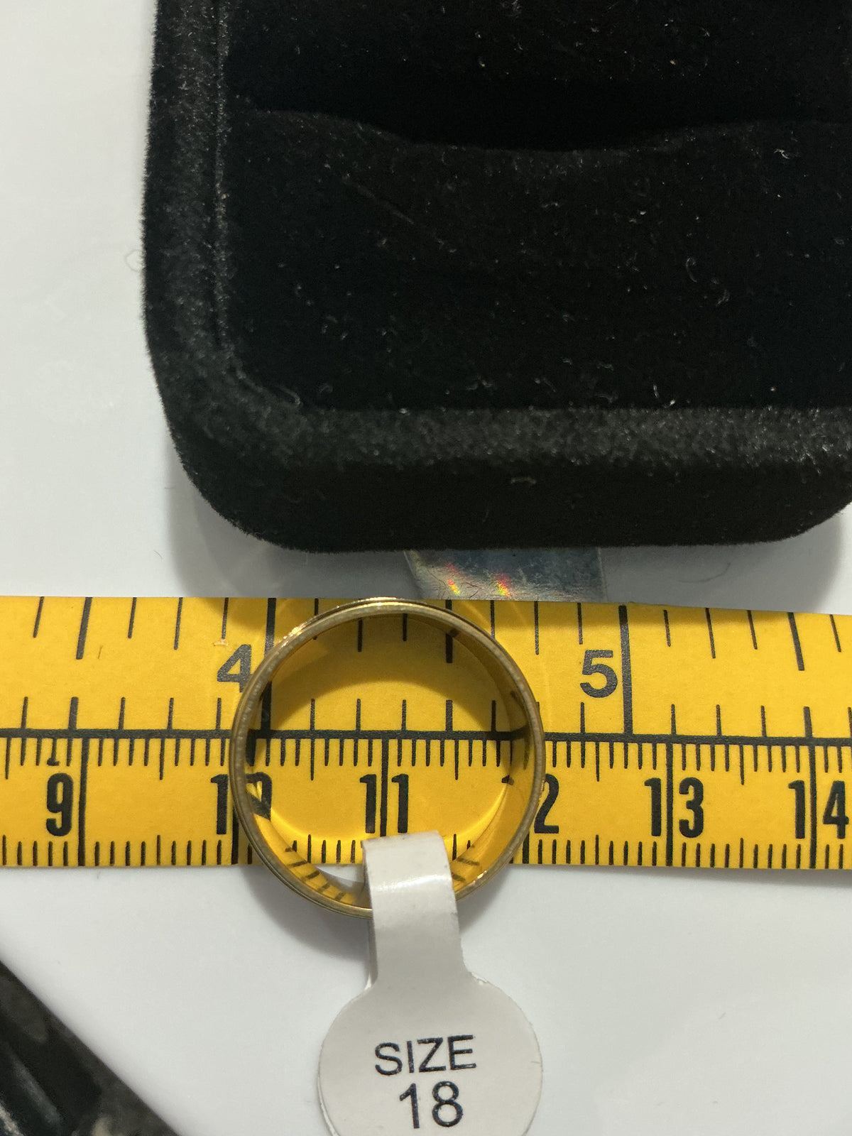 Original detail photograph of gold-tone ridged band