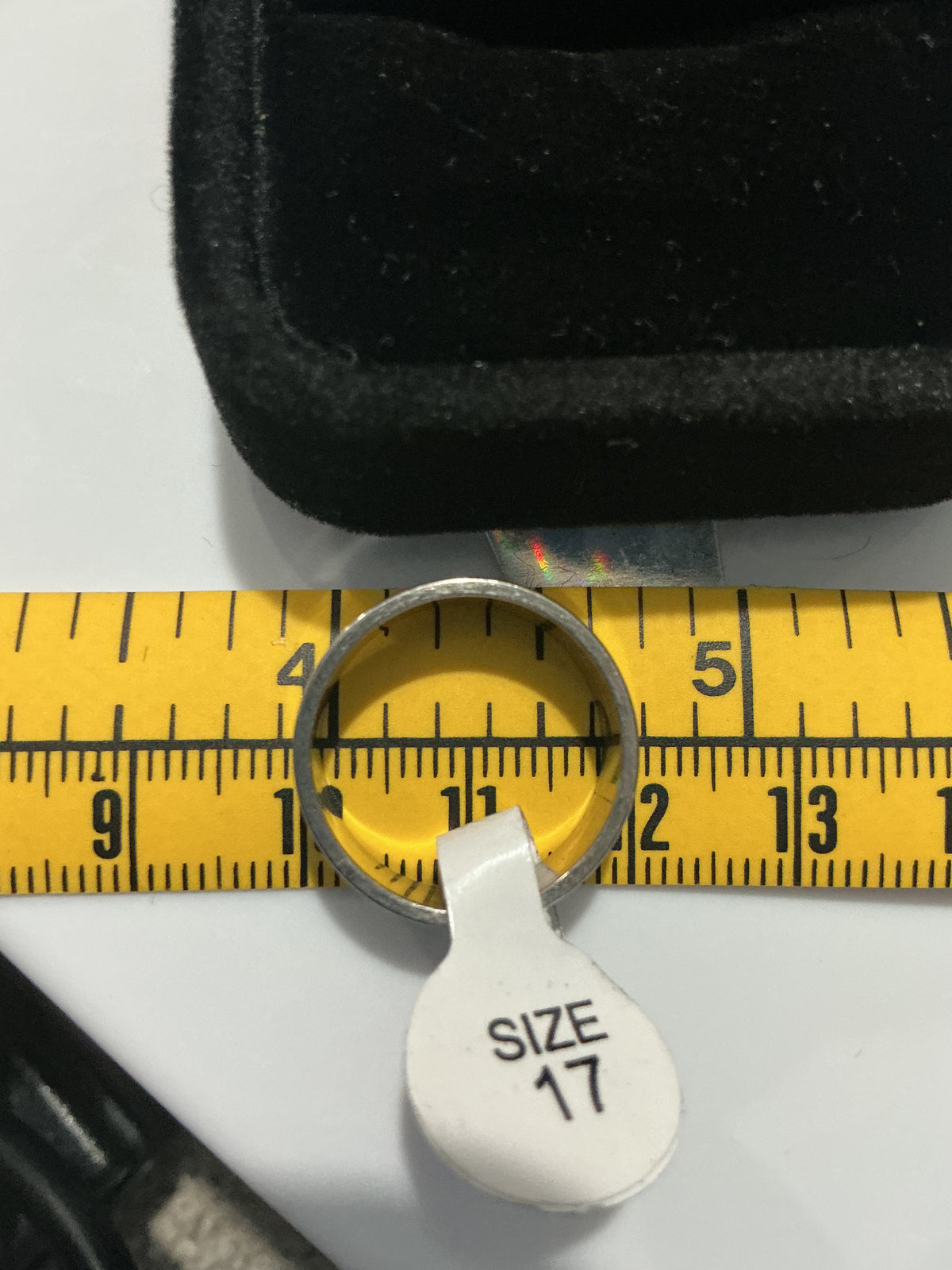 Original detail photograph of silver-tone polished double groove band