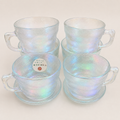 Iridescent textured glass cups with matching saucers