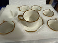 White and Gold-Tone Swirl Cup and Saucer Set – product view